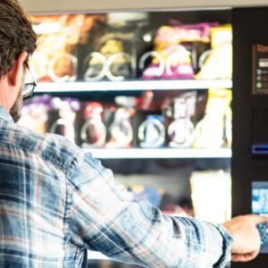 back-view-of-adult-mature-man-choosing-snacks-and-2021-09-03-21-12-19-utc-2