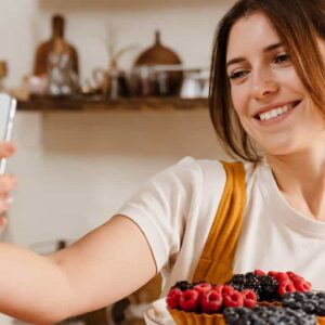 beautiful-smiling-pastry-chef-woman-taking-selfie-2021-09-02-01-38-50-utc-2