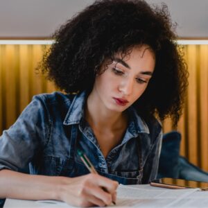 concentrated-young-african-woman-studying-in-a-cos-2025-01-09-06-05-59-utc (1)