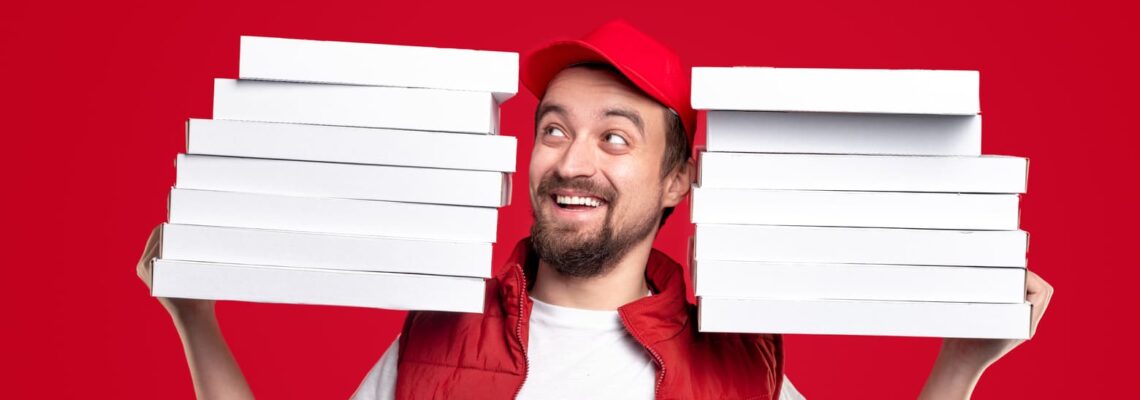 happy-delivery-man-with-pizza-boxes-2022-11-12-15-58-05-utc-1-2